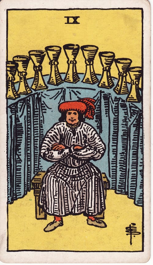 聖杯九(Nine of Cups)偉特塔羅牌面